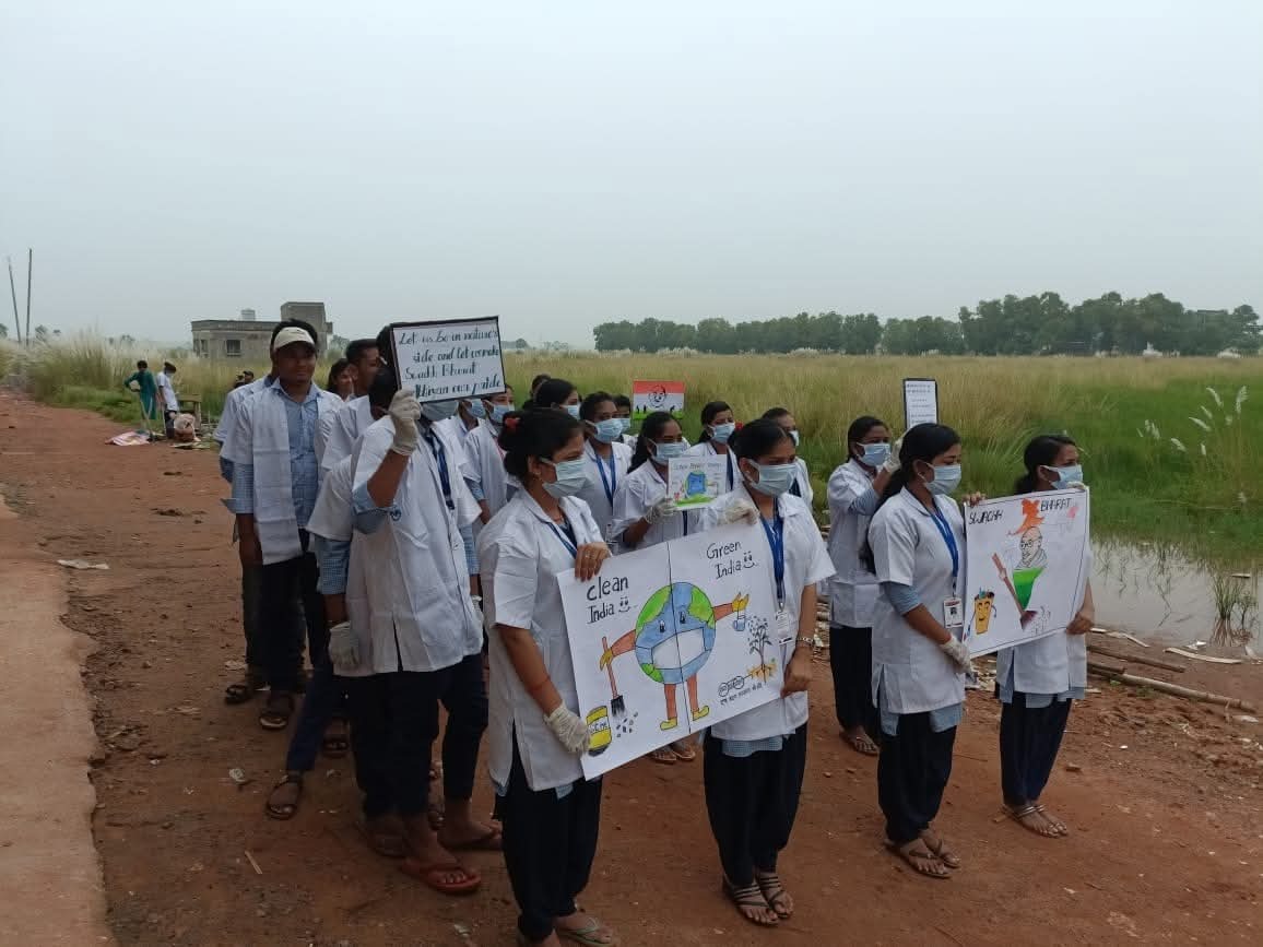DST Group students in a community cleanliness and health awareness campaign